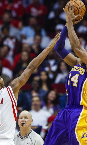 Bryant's 29 points lead Lakers to win over Howard-less Rockets